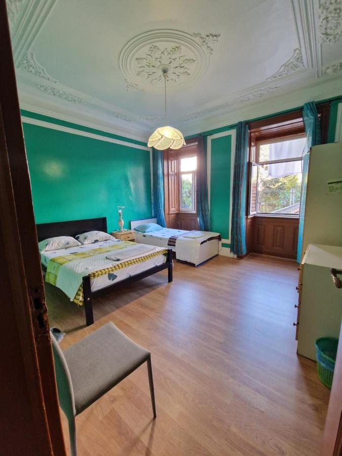 Quarto Triplo com Casa de Banho Partilhada